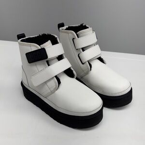 UGG Cream and Black Strap Boots